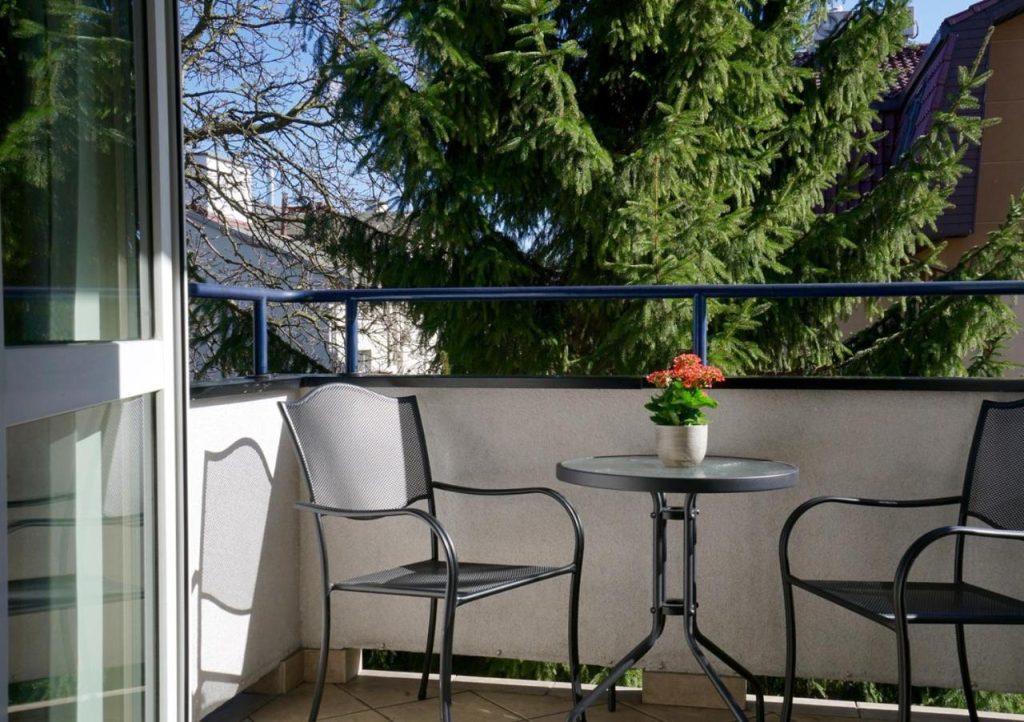Kameralny Apartament Victus z Balkonem by Noclegi Renters