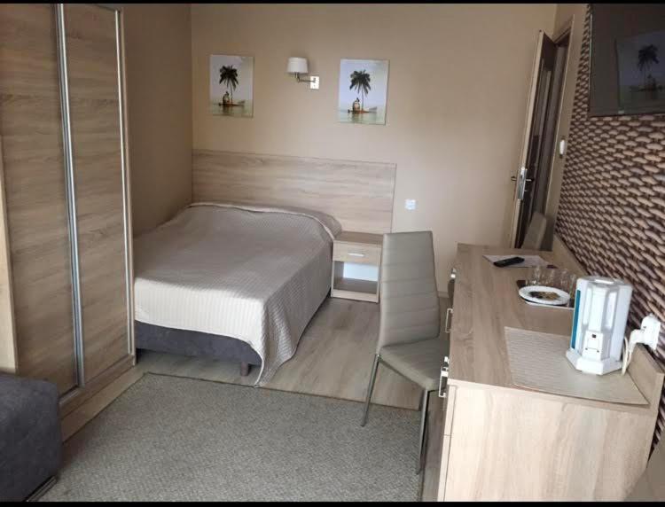 Pokoje i apartamenty „Iza”